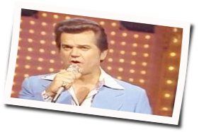 When You're In Love With A Beautiful Woman by Conway Twitty